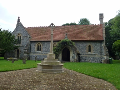 All Saints Church and war memorial in West Ilsley 